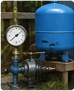 Well pressure gauge and pressure tank